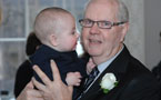 Jerome Tracey, of Port Hawkesbury,with his grandson at the Medal of Bravery ceremony yesterday.