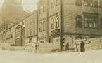 Argyle Street at the corner of George Street, Halifax, showing pine coffins supplied to Snow & Co., Undertakers, second building from right, for victims of the explosion.
