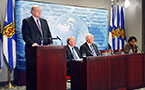 Dr. Robert Strang, chief public health officer for the province, stands at the podium at a news conference today, April 26, as (seated from right) Health Promotion and Protection deputy minister Duff Montgomery and Pat Dunn, Minister of Health Promotion and Protection, listen to Dr. Gaynor Watson-Creed, Capital Region medical officer of health, answer a media question.