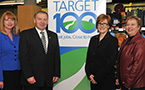FROM LEFT: Dianne Kelderman, chief executive officer of the Nova Scotia Co-operative Council, Premier Darrell Dexter, Anne Bedard, vice-president human resources, Credit Union Central, and Community Services Minister Denise Peterson-Rafuse stand with a Target 100 program sign.
