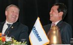 Premier Darrell Dexter (left) and Mr. Nam, president and CEO of DSME, share a laugh during the news conference.